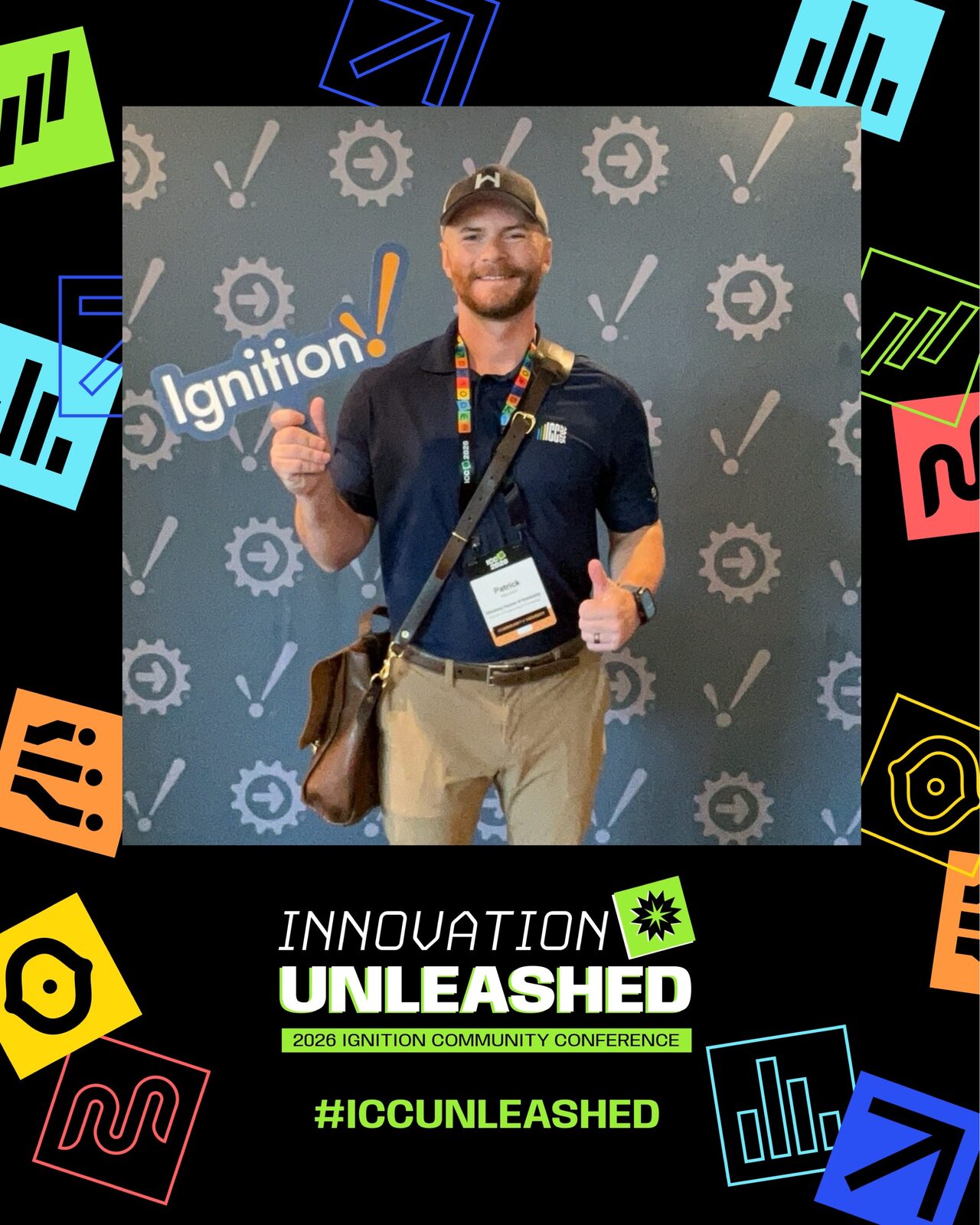 Patrick at the ICC 2026 photo wall, wearing a conference badge